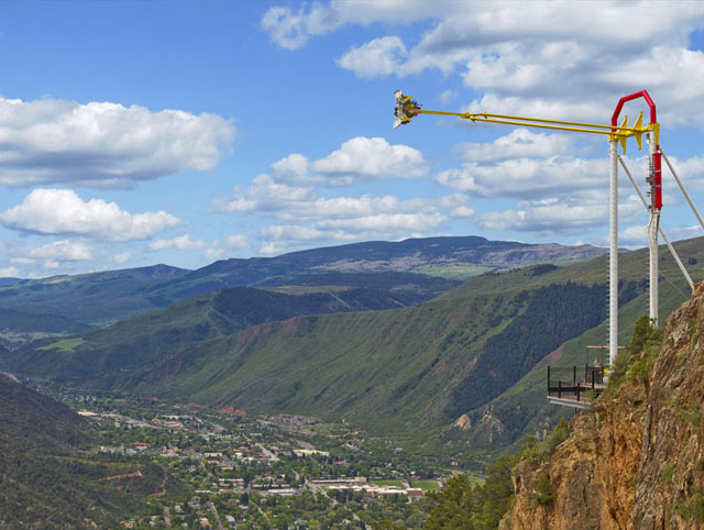 Adventure Park Swing Embark on a thrilling journey through this photo capturing the excitement of a theme-park ride atop Glenwood Caverns Adventure Park.